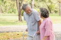 Happy elderly couple with lifestyle after retiree concept. Lovely asian seniors couple walking exercise in the park in the morning Royalty Free Stock Photo