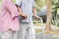 Happy elderly couple with lifestyle after retiree concept. Lovely asian seniors couple walking exercise in the park in the morning Royalty Free Stock Photo