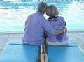 Happy Elderly couple near pool Royalty Free Stock Photo