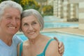 Happy Elderly couple near pool Royalty Free Stock Photo