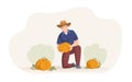 Happy elderly male farmer posing with pumpkins mature man agricultural worker picking harvest