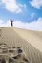 Happy elderly man standing on the white sand Royalty Free Stock Photo