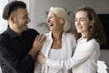 Happy elderly mom and adult son and daughter hugging Royalty Free Stock Photo