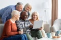 Happy elderly people spending time together at home Royalty Free Stock Photo
