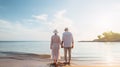 Happy elderly retired couple, walking and holding hands on the beach.Generative AI