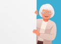 Happy elderly woman with glasses holds an empty poster. A white poster for advertising