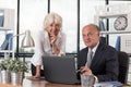 Happy elders in the office Royalty Free Stock Photo