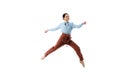 Happy elegant ballerina jumping isolated on