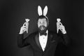 Happy elegant businessman wear rabbit ears. Rabbit costume party. Bunny or hare. Easter symbol. Holiday celebration