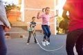 Children playing with skipping rope Royalty Free Stock Photo