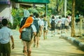 Happy students having fun on street after school