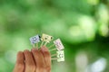 Happy emoticon paperclip on finger. Concept of positive thinking, mental health, emotional control Royalty Free Stock Photo