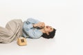 Happy, emotional, young woman lying on floor and talking on retro style phone, having fun on conversation, isolated on Royalty Free Stock Photo