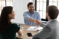 Happy employee candidate shaking hands with employer or recruiter Royalty Free Stock Photo