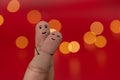 Happy and enamored fingers couple with red background and blur effect, bokeh. Valentines day concept