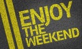 Happy Enjoy the Weekend written on the road Royalty Free Stock Photo