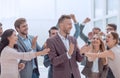 happy entrepreneur standing in front of his business team Royalty Free Stock Photo