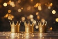 Happy Epiphany day. Three royal crowns on golden bokeh background