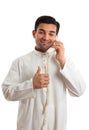 Happy ethnic businessman on phone Royalty Free Stock Photo