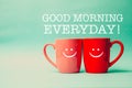 Happy everyday word with Two cups of coffee and stand together