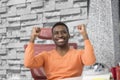 Happy excited businessman celebrate his success. Winner, black man in office reading on laptop, copy space Royalty Free Stock Photo