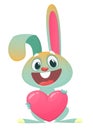 Happy excited cartoon rabbit holding a heart. St. Valentine`s Day. Vector illustration of a smiling bunny. Royalty Free Stock Photo