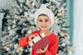 Happy excited child holding christmas gift box Royalty Free Stock Photo