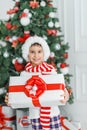 Happy excited child holding christmas gift box Royalty Free Stock Photo