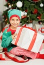 Happy excited child holding christmas gift box Royalty Free Stock Photo