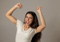 Happy excited and euphoric attractive young woman celebrating money win and success Royalty Free Stock Photo