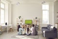 Happy excited family with children watching soccer match on tv at home Royalty Free Stock Photo