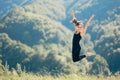 Happy Excited Fitness Woman Raising Arms Celebrating with Victory Sign