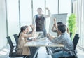 Happy excited multi-ethnic business team in casual  celebrating victory, raising hands and applauding, unexpected win, stock Royalty Free Stock Photo