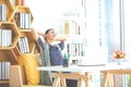 Happy excited successful businesswoman and smiling on desk at modern office workplace with computer laptops. Sucess job and happy Royalty Free Stock Photo