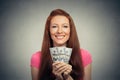 Happy excited successful young business woman holding money dollar bills Royalty Free Stock Photo