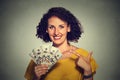 Happy excited successful young business woman holding money dollar bills in hand Royalty Free Stock Photo