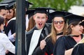 Happy excited university students graduating graduation day Royalty Free Stock Photo