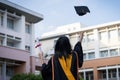 A happy and excited young Asian female university graduate Royalty Free Stock Photo