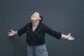 Happy excited young asian woman open her arms to the sky and enjoying life celebrating and success Royalty Free Stock Photo