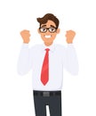 Happy and excited young business man celebrating victory expressing success, power, energy and positive emotions. Royalty Free Stock Photo