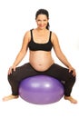 Happy expectant woman on pilates ball Royalty Free Stock Photo