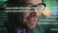 Happy expert creating code at data hologram closeup. Developer man programming