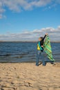 Happy expressive woman enjoying life and resting on the river ba Royalty Free Stock Photo