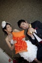 Happy face of groom and bride in wedding suit at home Royalty Free Stock Photo