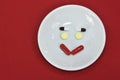 Happy face made of medicine. pain medication tablets. colored pills on porcelain dish. Assorted pharmaceutical pills