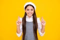 Happy face, positive and smiling emotions of teenager girl. Pleased cheerful teenager child wishing good luck, crosses