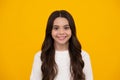 Happy face, positive and smiling emotions of teenager girl. Portrait of beautiful happy smiling teenage girl on yellow Royalty Free Stock Photo