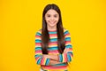 Happy face, positive and smiling emotions of teenager girl. Portrait of young teenage child standing with crossed arms Royalty Free Stock Photo