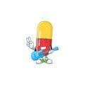 Happy face of red yellow capsules cartoon plays music with a guitar