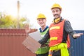 Happy factory worker man team in hard hat smiling and looking at camera with joy, Happiness and funny concept Royalty Free Stock Photo